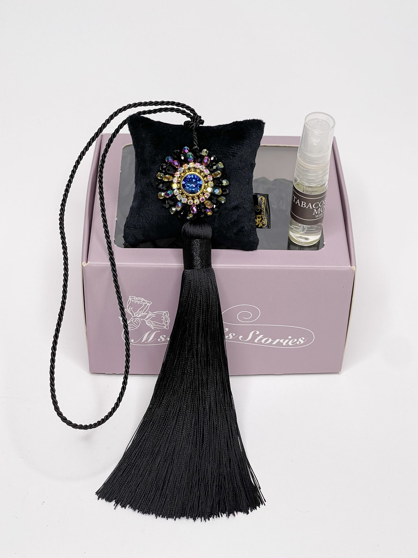Hanging fragrance with sparkling crystals and long tassel.