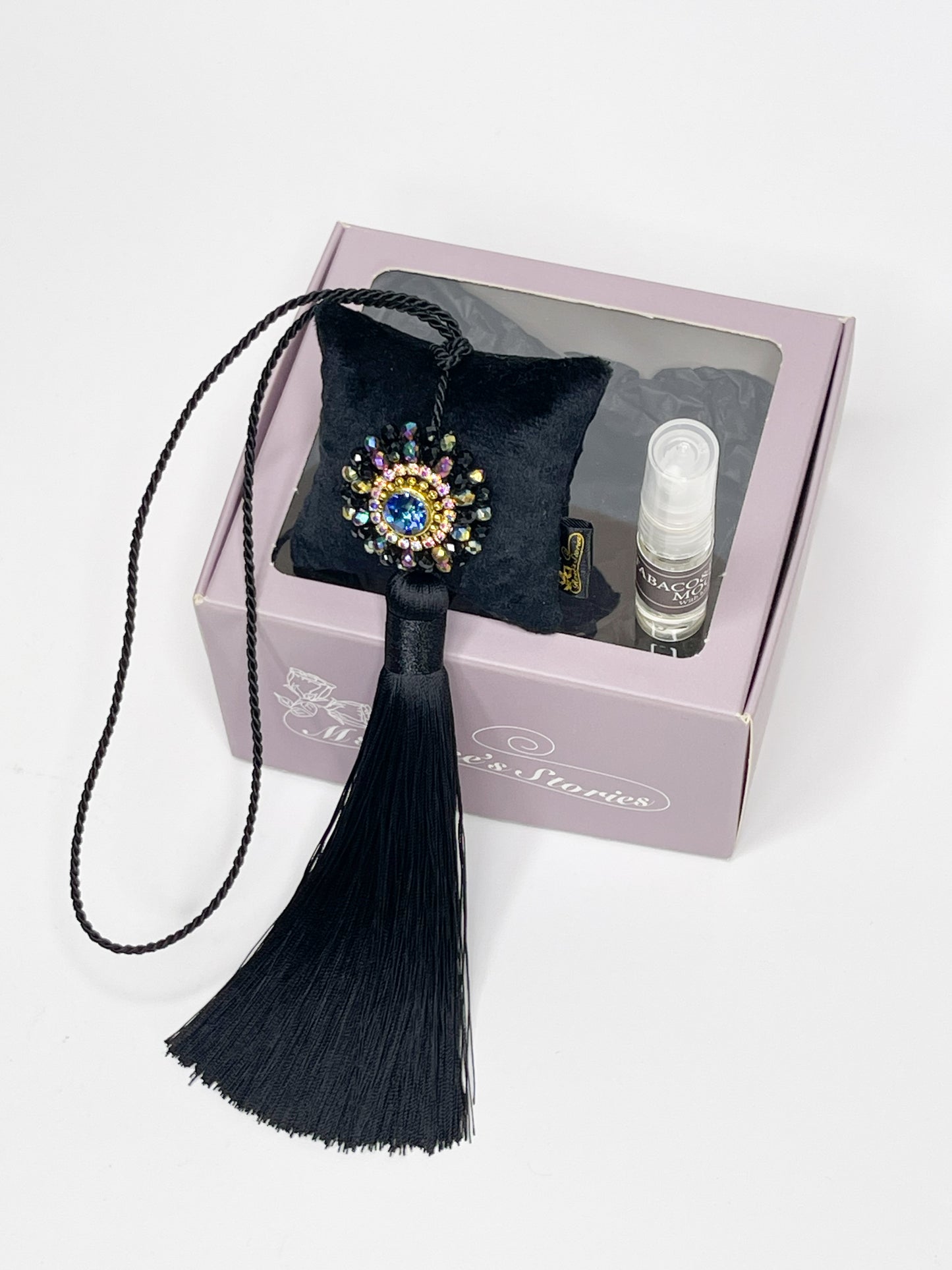Hanging fragrance with sparkling crystals and long tassel.