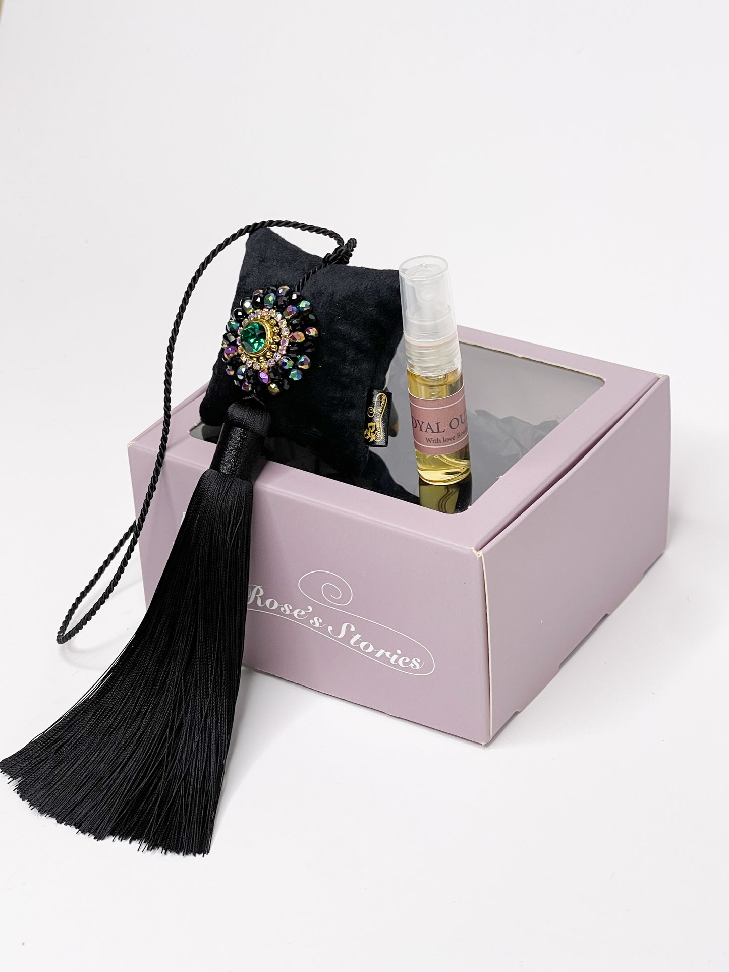 Hanging fragrance with sparkling crystals and long tassel.
