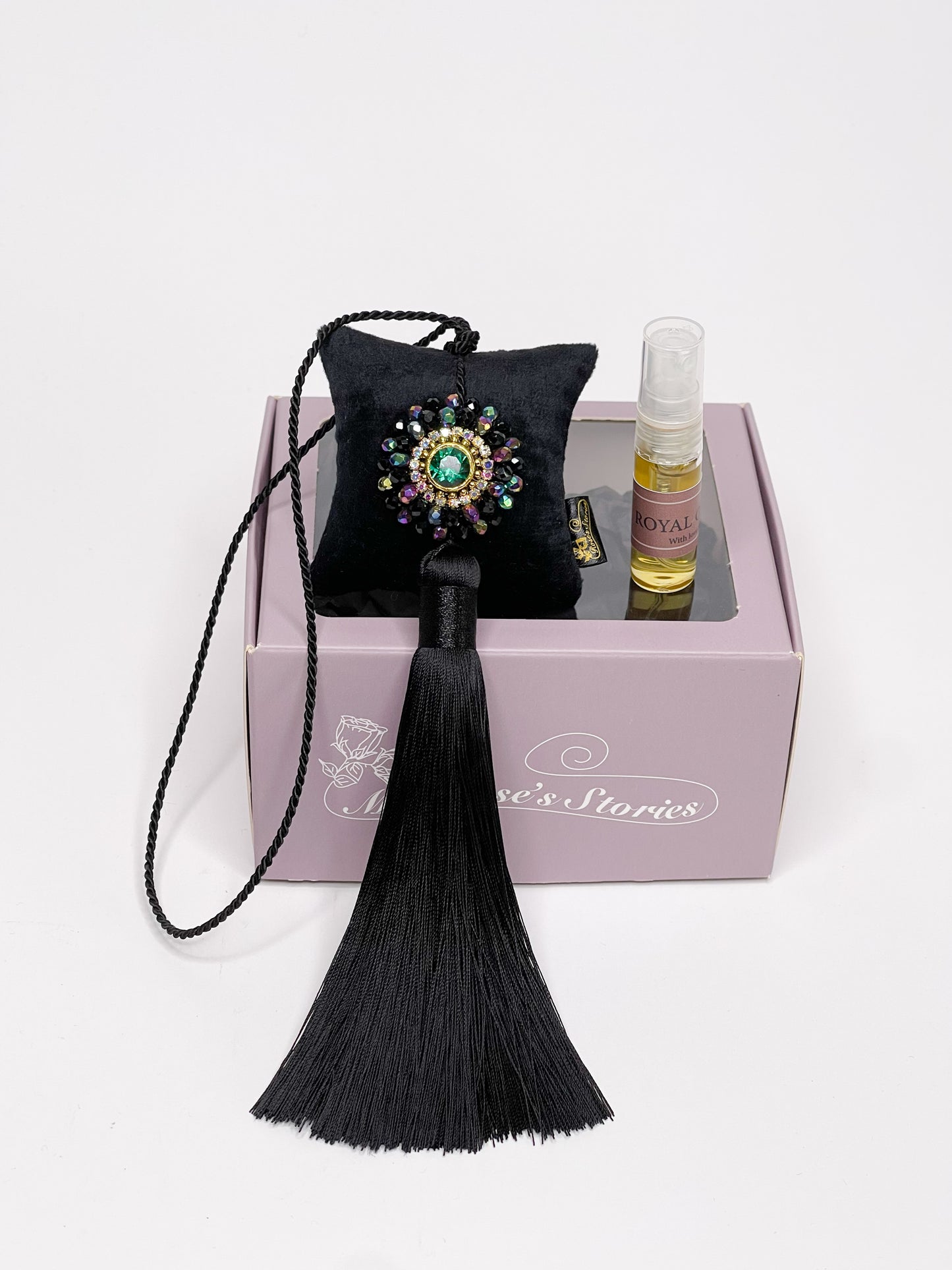 Hanging fragrance with sparkling crystals and long tassel.