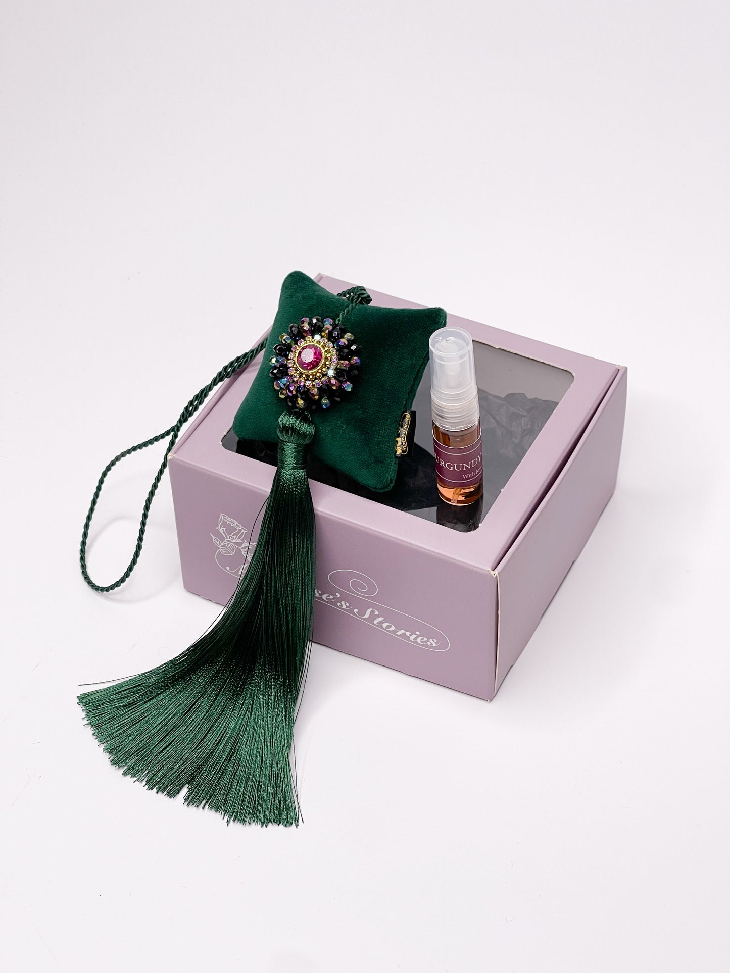 Hanging fragrance with sparkling crystals and long tassel.